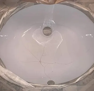 Restored antique pedestal sinks with professional refinishing