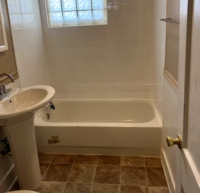 Professional refinishing of wall mounted sinks