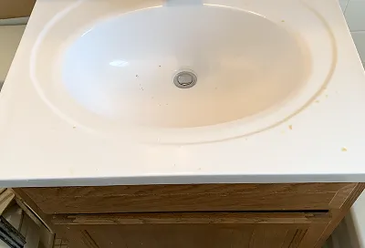 Refinished sink after reglazing looking clean and restored