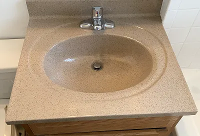 Sink after reglazing with smooth, glossy, like-new finish