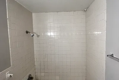 Bathroom wall tiles after restoration and reglazing service