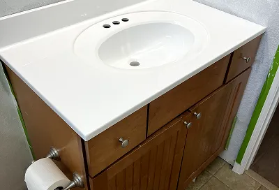 Sink after reglazing with smooth, glossy, like-new finish