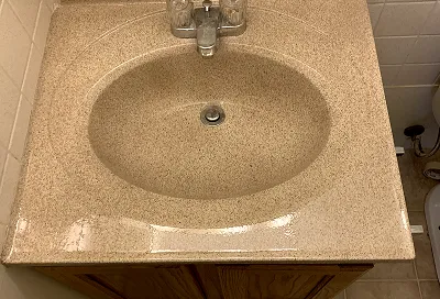 Bathroom sink after professional reglazing and restoration