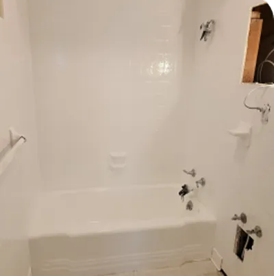 Professional refinishing of bathroom walls and shower surrounds