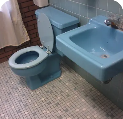 Professional refinishing of colored toilets to restore vibrant finish