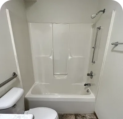 Professional refinishing of fiberglass shower inserts