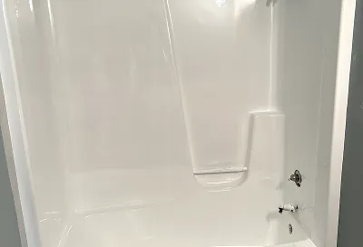 Shower stall after professional reglazing fully refreshed